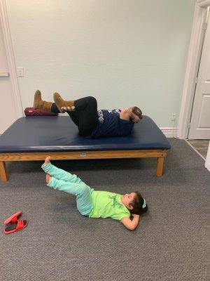 Mom and daughter working together to get strong and healthy at Paragon Integrated Medical. ‍