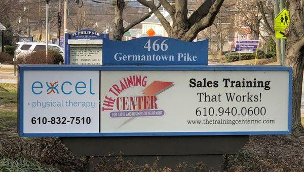 Sign set near the building from Germantown Pike.