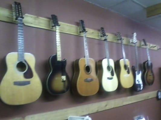 Guitar hospital.  Patients waiting their turn...