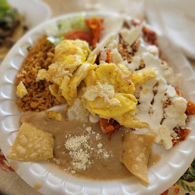 Red Chilaquiles with added Queso Fresco