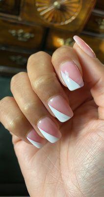 Angled French tips. 2 nail techs  Vincent - fill in  Tony - buffing, shaping and polish application