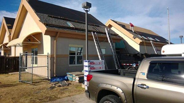 Roofing the Muskogee Nation Child Development Center.