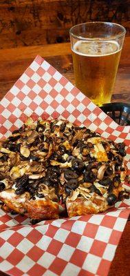 My mushroom and olive pizza and a beer