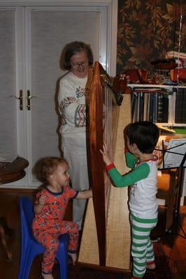 One of our students sharing the harp with her grandchildren