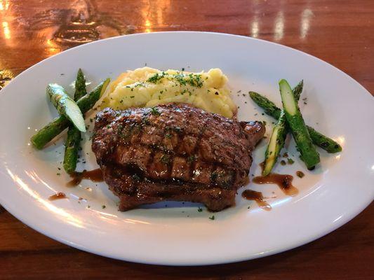 Grilled Rib Eye- 
Mashed Potatoes, Grilled Asparagus,
Red wine sauce.