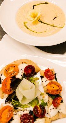 (bottom) Heirloom Cherry Tomatoes Flatbread with Fresh Mozzarella and Basil (top) Ohio Sweet Corn Bisque, Mint oil and Yellow Nasturtium.