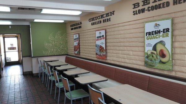 This is the dining room.  The painted brick doesn't make for the most inviting setting.