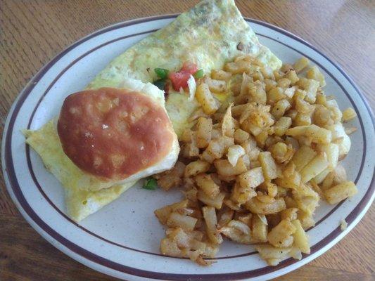 Veggie omelet (with cheese added), biscuit, and hash browns. Best hash browns I've had in awhile, seasoned quite well!