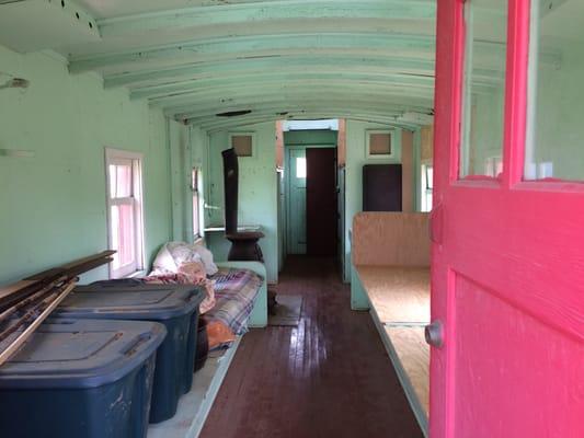 A look inside a 140+ year-old caboose made of wood.