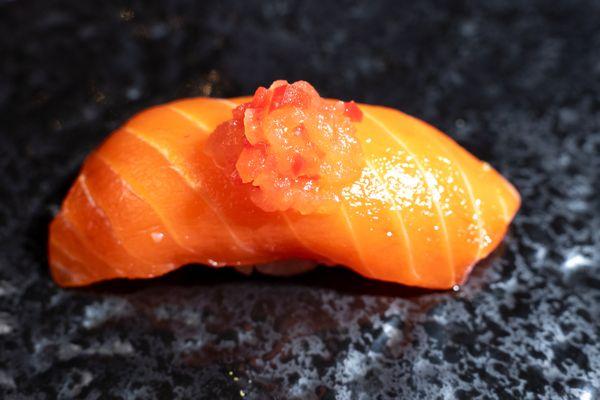 King salmon topped with chopped tomato