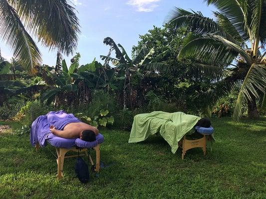 My husband and I having an outdoor massage.