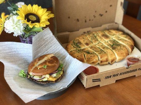 Vegan burger and vegan garlic bread