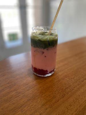 Iced Strawberry Matcha Latte with fresh house made strawberry compote and Strawberry infused Oat Milk