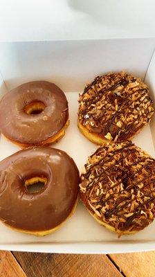 Chocolate glazed donuts and roasted coconut