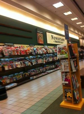 The magazine aisle near the 'comfy chairs.