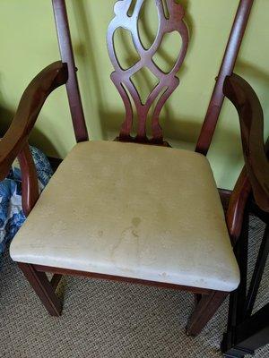 random stained dining chair in the living area