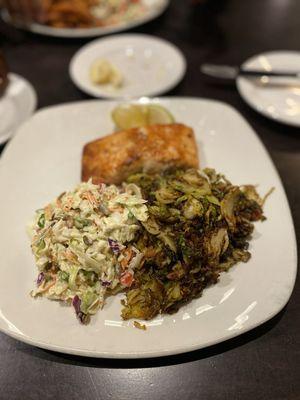 Salmon with brussel sprouts and smoking slaw.