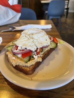 Mediterranean toast with an egg on top