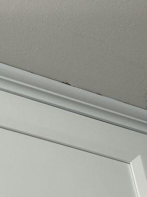 Big gap between molding and ceiling and they didn't patch until I brought it up