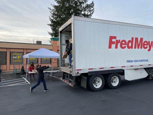 Unloading trucks for Food Bank Friday's