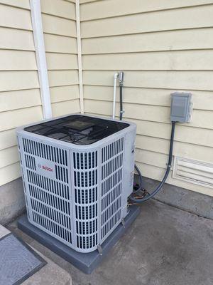 The Bosch heat-pump is installed and pushing sweet cool air to our home!