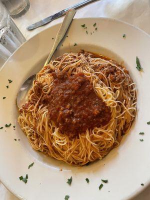 Angel Hair Pasta with Meat Sauce. No soup or salad offered with any dinners. This was $17.