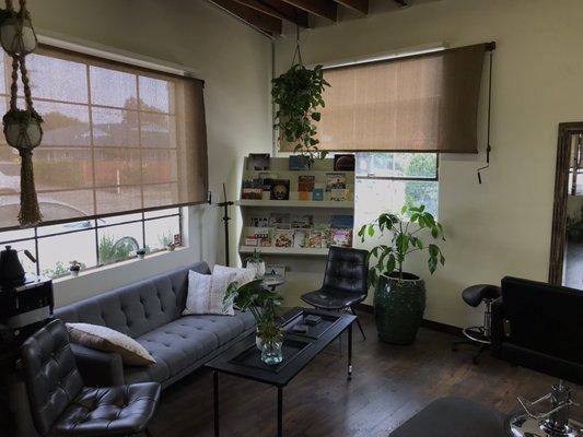 Cute waiting area! Tons of plants all throughout the salon.