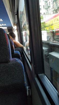 Waiting for the bus to leave nyc. This bus has usb on top and outlets under the windows.