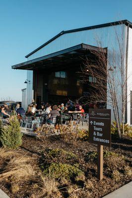 Main patio on the north side of 45th Parallel Distillery's restaurant and bar.