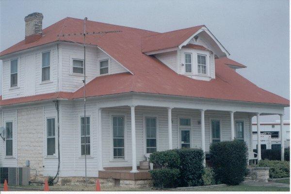 HISTORY: This large two story house on the north side of IH-10 four miles south of Boerne was built in 1904 by Gus Schattenberg.