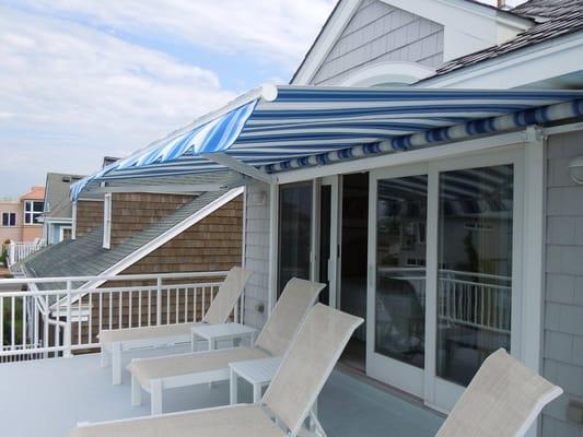 Lloyds of Millville Awnings and Canopies. Retractable Awning,"Keeping you covered for more than 75 years."