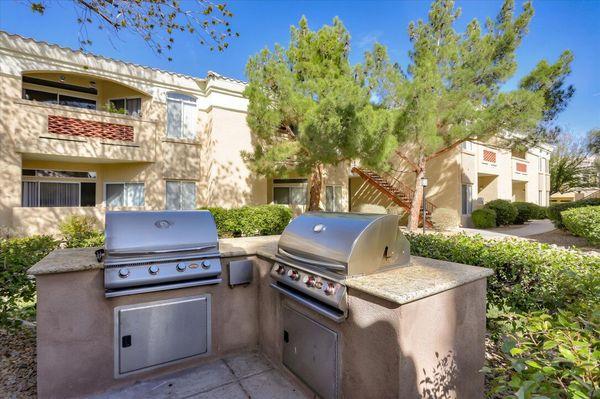 Image of outdoor gas barbeque grilling stations.