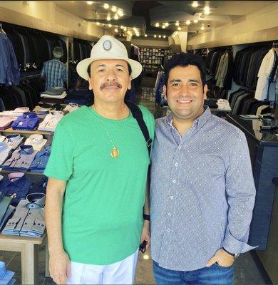 Loyal client Carlos Santana stopping by to pick out some new threads