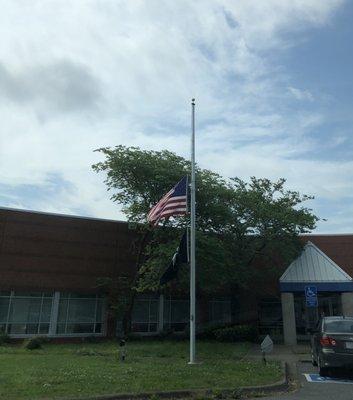 Front entrance with flags at half mast for this memorial weekend