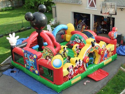 MIckey and Minnie at their best!  Your young ones will love this over the top bouncer for your next party or event!