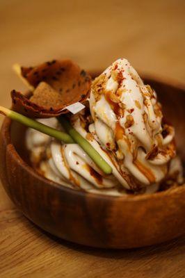 Charred coconut soft serve ice cream with sweet soy sauce, green tea pocky and Japanese granola