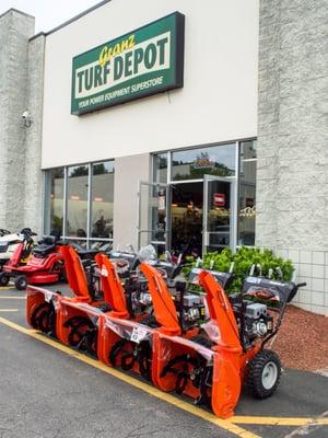 Ariens snowblowers in front of the store.