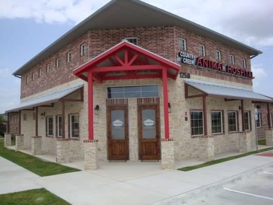 Front entrance to clinic facing CVS parking lot and Alma/Exchange intersection.