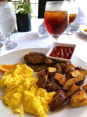 Scrambled eggs, potatoes, and sausage