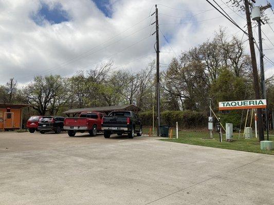 Look for that TAQUERIA and turn in there. You can see Orange taco truck on the left.