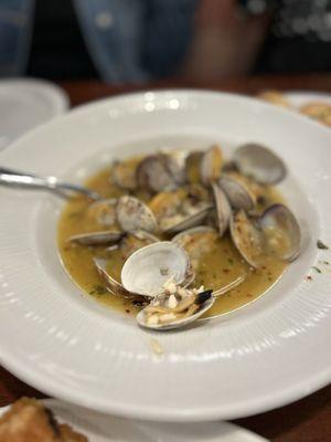 Clams. We ordered bread on the side. Super delicious to dip it in the broth