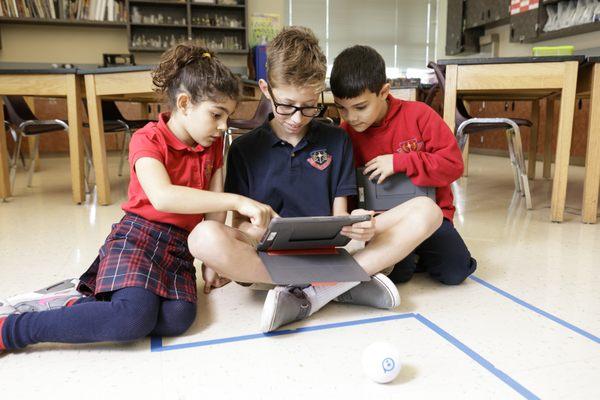 1:1 iPad to student ratio for all grades