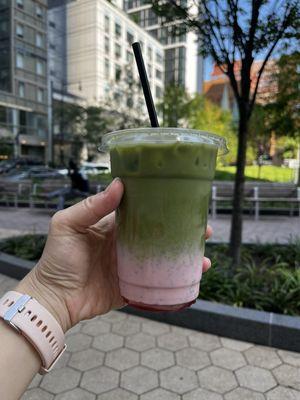 Matcha latte with strawberry purée. Well balanced, not too sweet or strong.