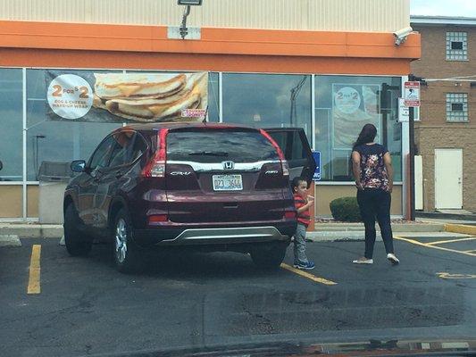 Went from parking in the driveway with her hazards on to parking like this after numerous people beeped and flipped her off.