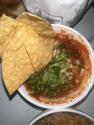 Salsa (spicy) and chips (super good)