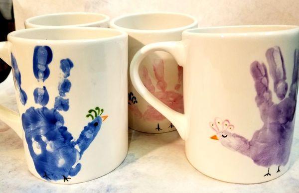 Handprint mugs.