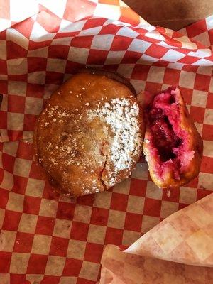 Donuts with lots of raspberry rhubarb filling