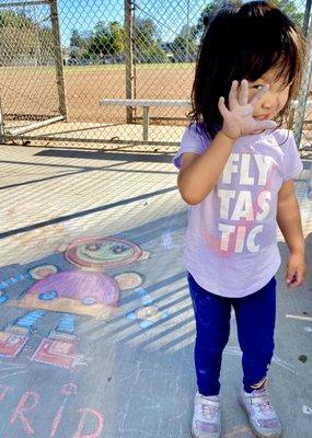 Posing next to her (chalk art) robot!!