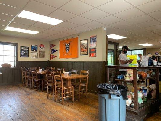 Partial view of dining area and the owner who helped us with our selections!