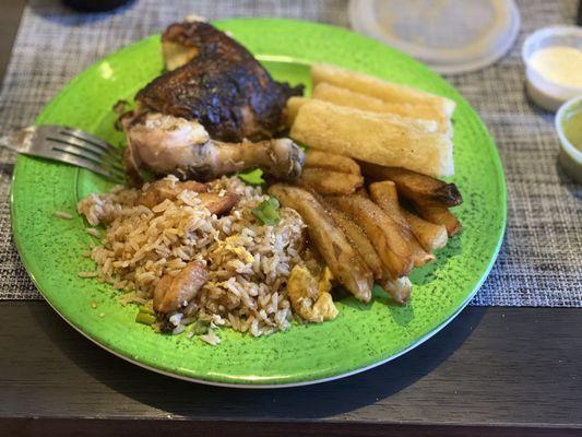 Chicken, yuca, rice, and fries.